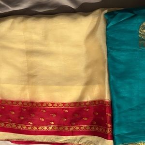 Two gently used silk sarees.